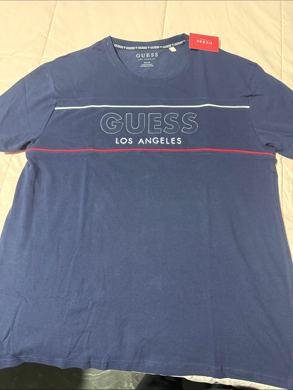 GUESS Navy Blue Short-Sleeve Logo Tee with Red & White Stripes
Several sizes